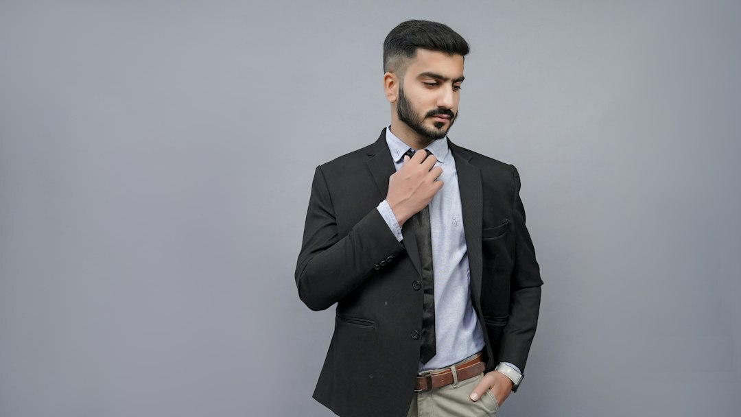 Studio portrait of a smiling businessman in a suit